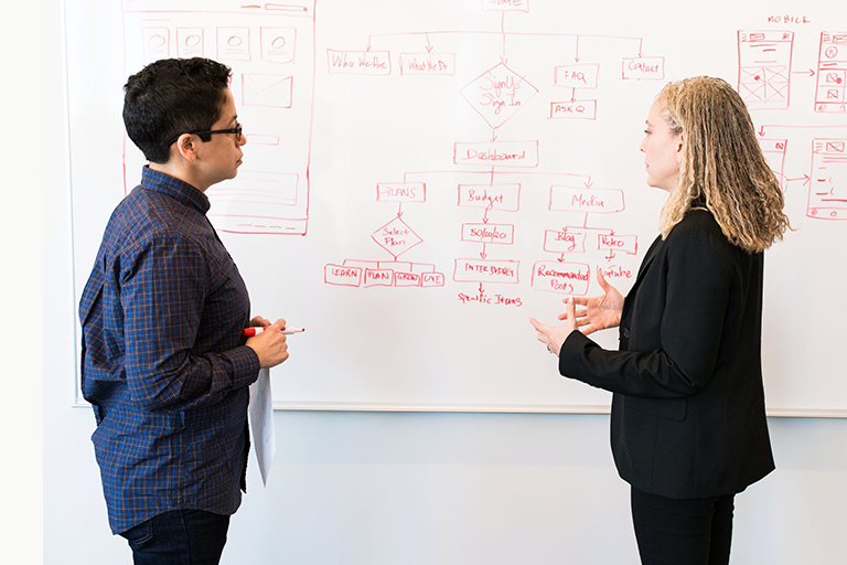 Student and instructor discussing strategy